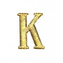 Metalowa literka "K" na pagony kursantów